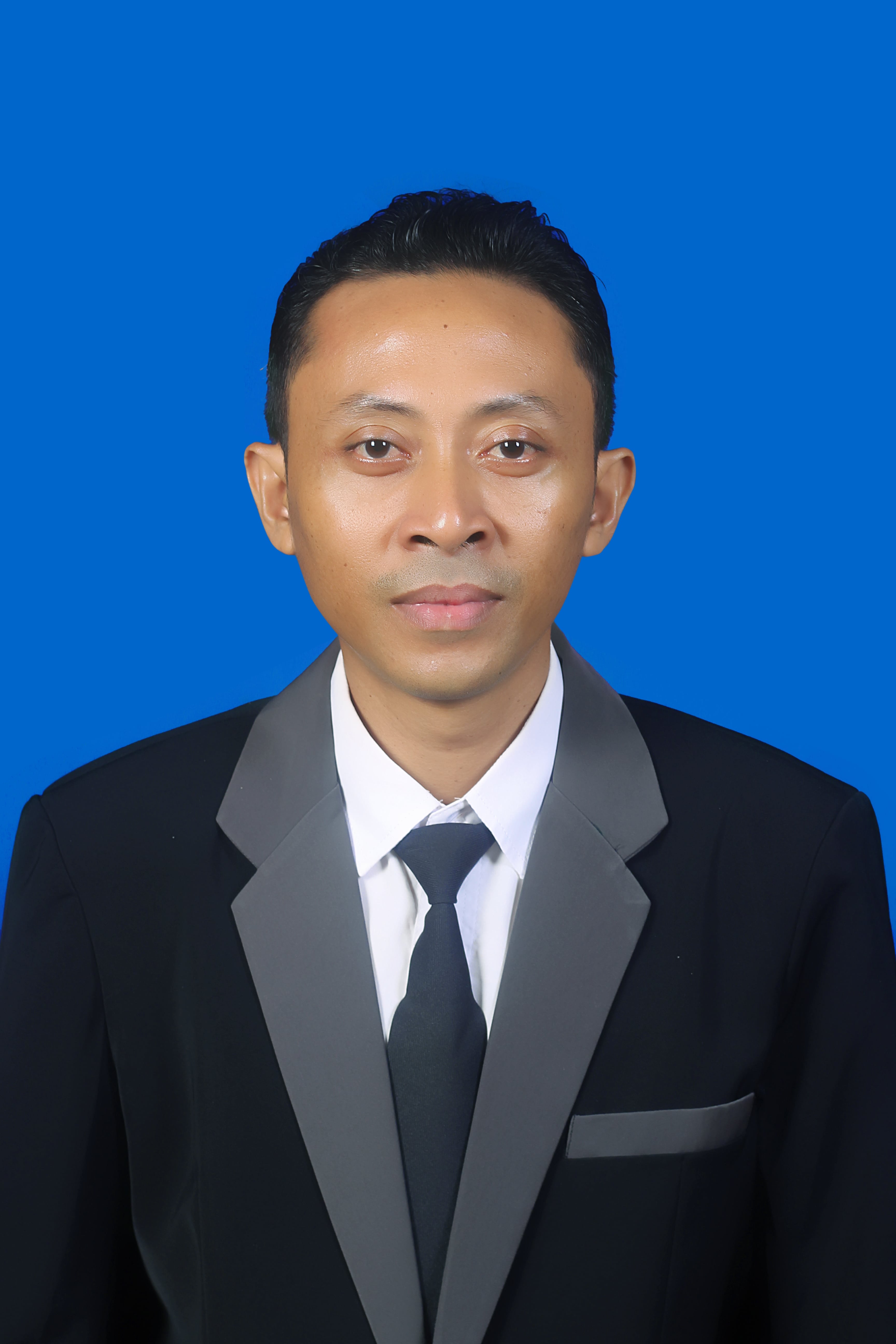 Dr. Putu Artawan, S.Pd., M.Si.